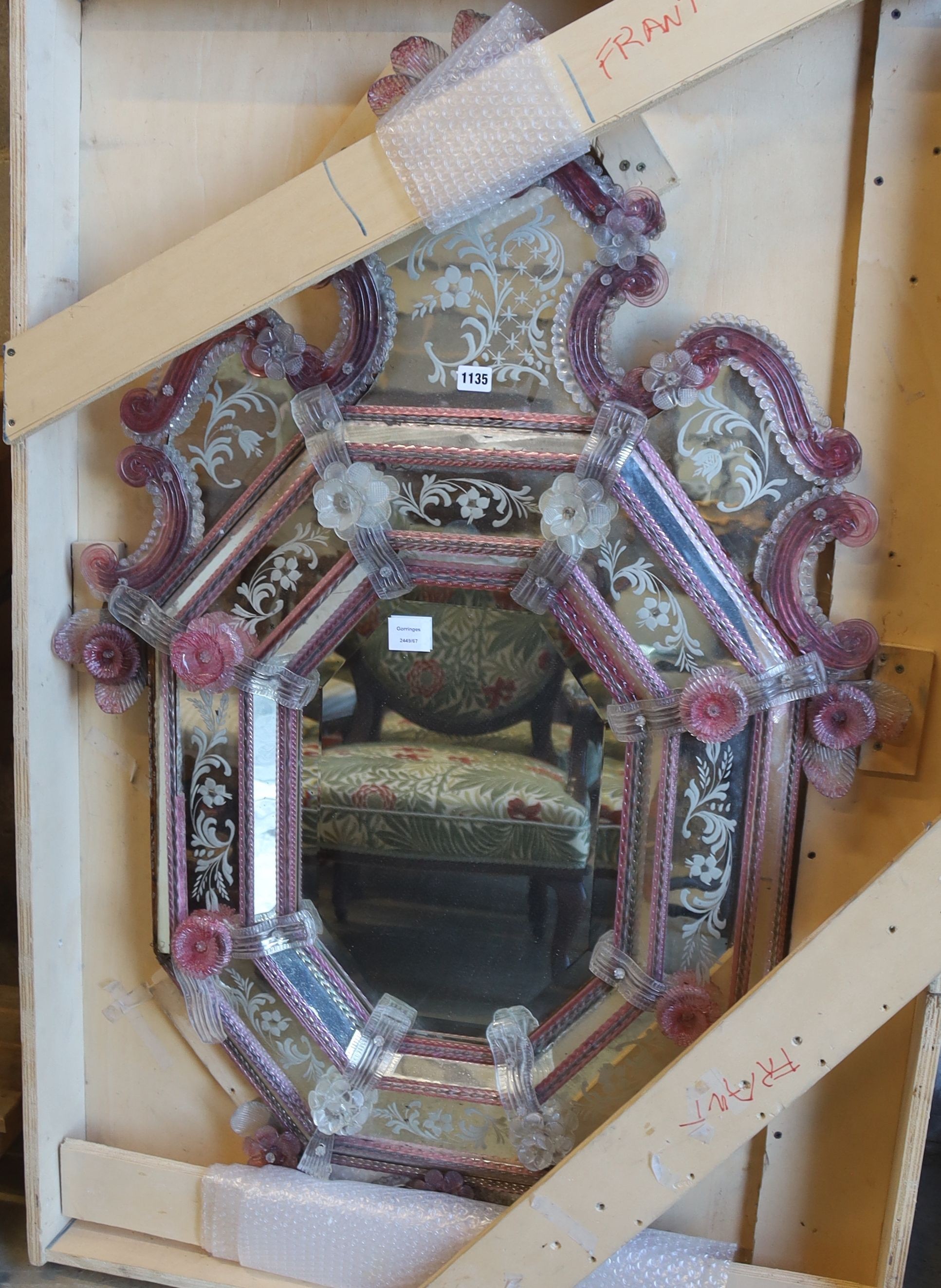 A Venetian etched pink and clear glass wall mirror with octagonal plate, (damage) width 84cm, height 120cm